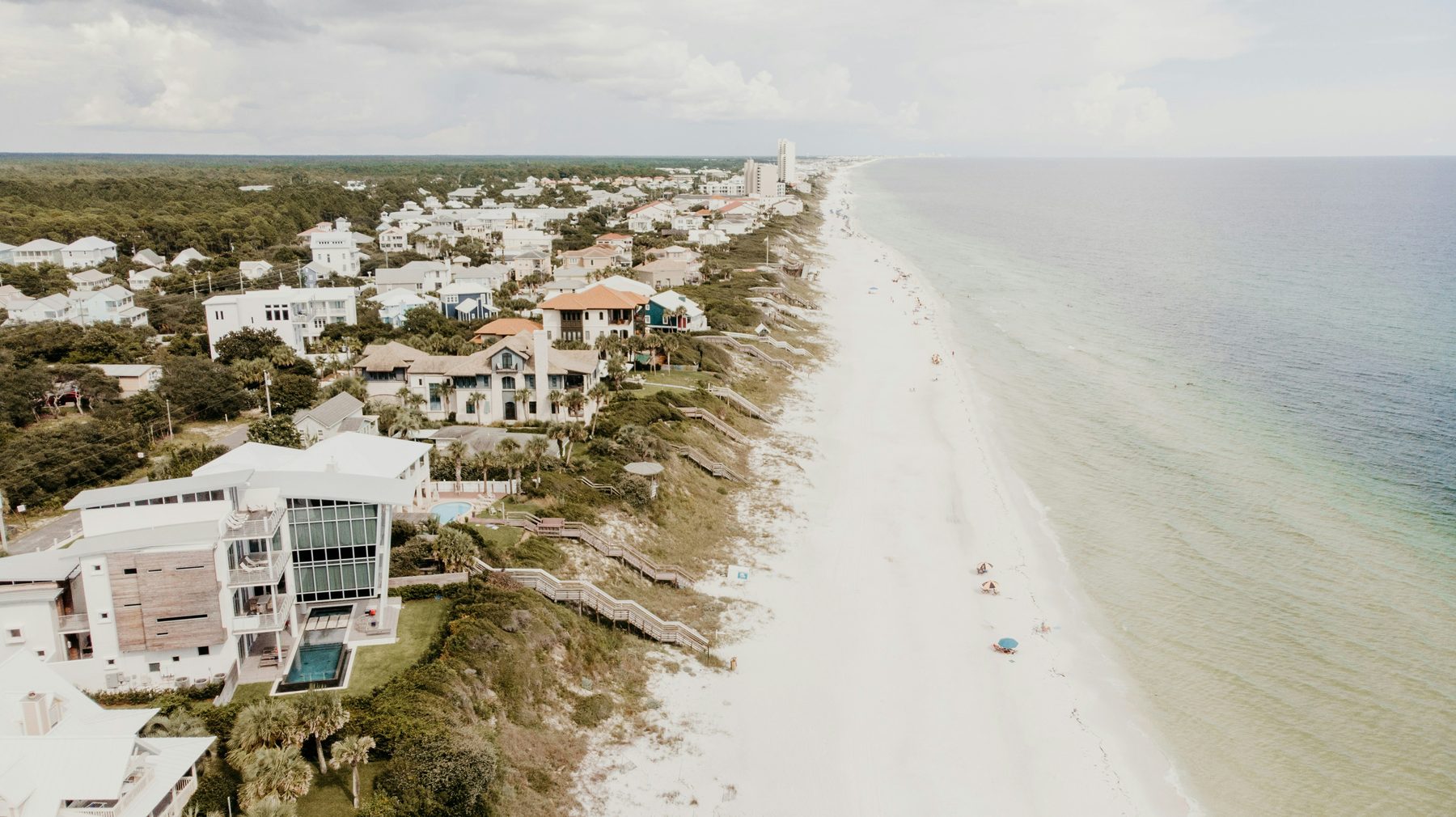 Aerial view of Florida coastal community with white sand beach and Atlantic Ocean